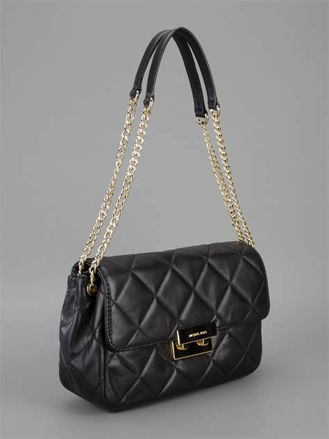 michael kors white bag with black piping|Michael Kors quilted black bag.